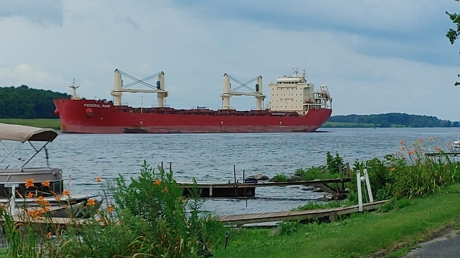 arlor-haven-campground-large-ship-on-river-passing-campground