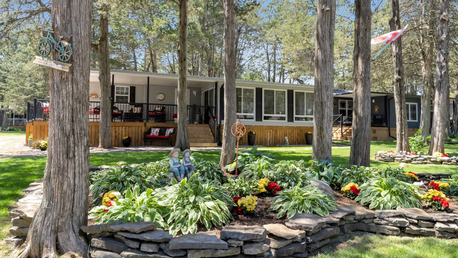 ashton-park-estates-park-model-nestled-in-trees-with-gardens